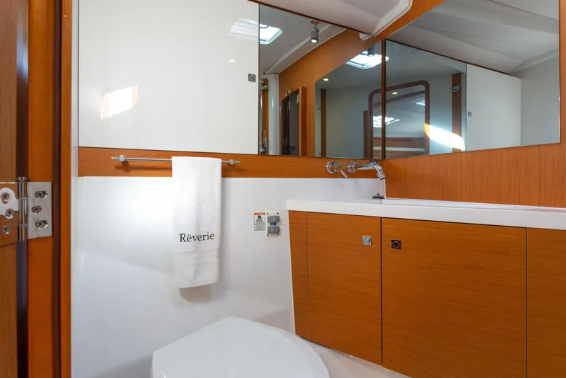Slide: The Image of Luxurious interior of 2015 Jeanneau 53 yacht featuring cozy bedroom and modern bathroom. - 44