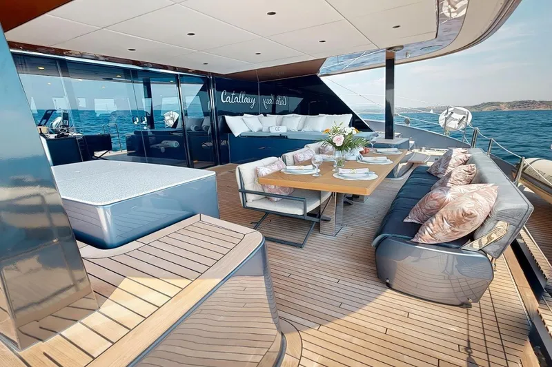 Slide: The Image of Luxurious deck of 2024 Sunreef 60 Sail Eco yacht with elegant dining setup. - 3
