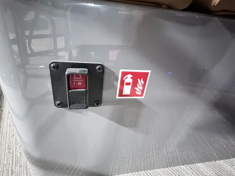 Slide: The Image of Switch and fire extinguisher symbol on Sylvan G5 CLZ DH Arch Tritoon 2026. - 10