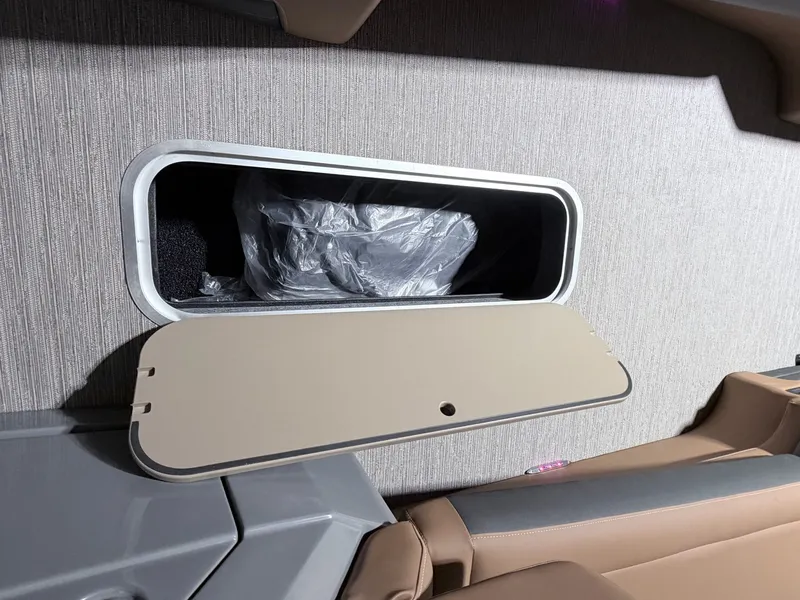 Slide: The Image of Interior of 2026 Sylvan G5 CLZ DH Arch Tritoon with storage compartment. - 20