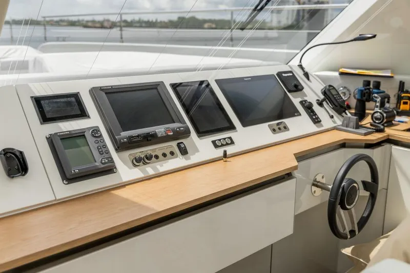 Slide: The Image of Modern helm station of 2024 Sunreef 80 Power yacht with advanced navigation equipment. - 11