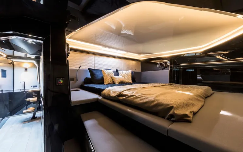 Slide: The Image of Luxurious interior of 2018 Sunreef 40 Power yacht with modern lighting and cozy bedding. - 13
