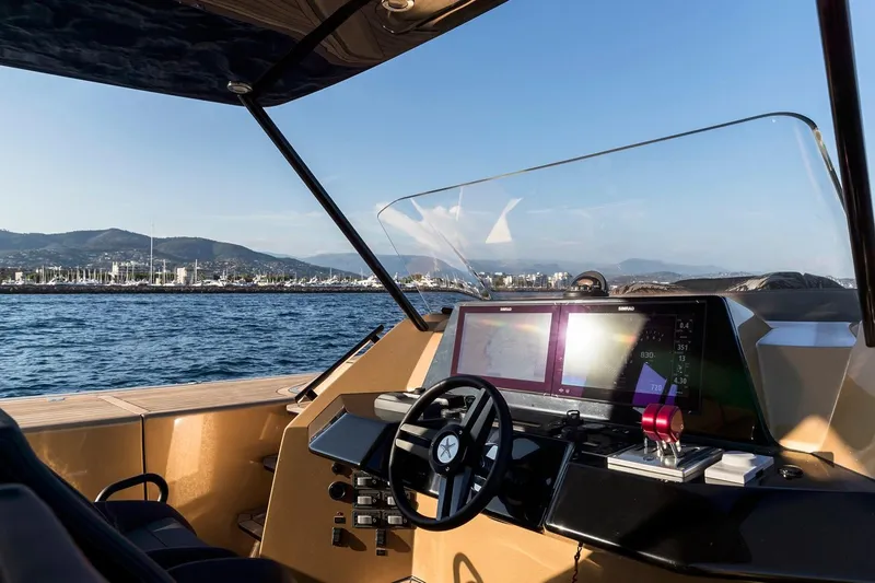 Slide: The Image of Helm of 2018 Sunreef 40 Power yacht with scenic ocean view. - 9