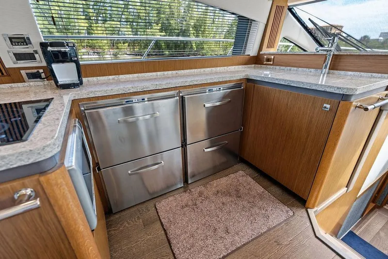 Slide: The Image of Luxurious kitchen interior of 2017 Sea Ray Fly 510 yacht with modern appliances. - 20