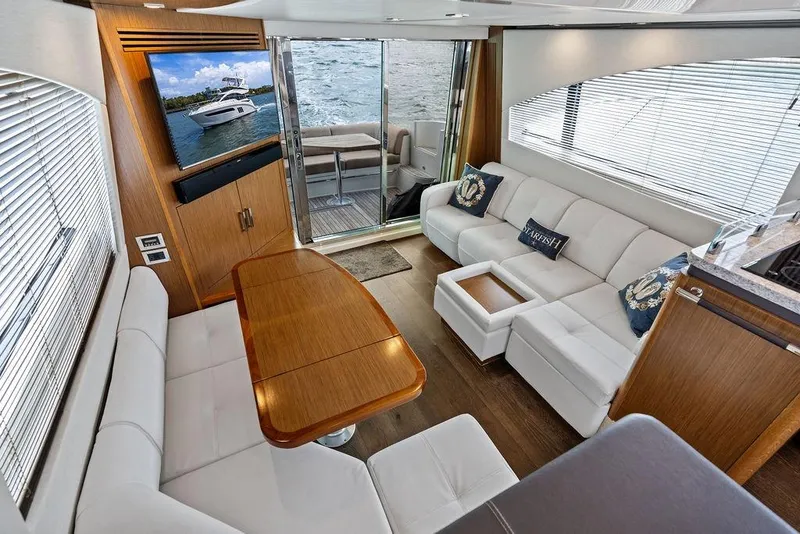 Slide: The Image of Luxurious interior of 2017 Sea Ray Fly 510 yacht with elegant seating and modern decor. - 22