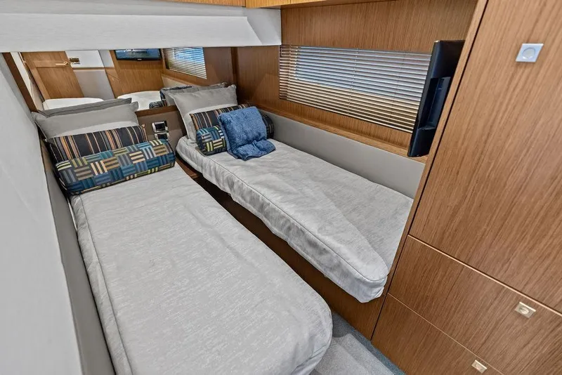Slide: The Image of Luxurious twin cabin interior of 2017 Sea Ray Fly 510 yacht with modern decor. - 29