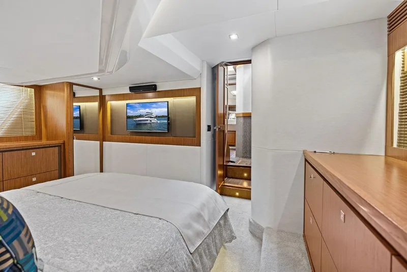 Slide: The Image of Luxurious bedroom interior of 2017 Sea Ray Fly 510 yacht with modern amenities. - 33