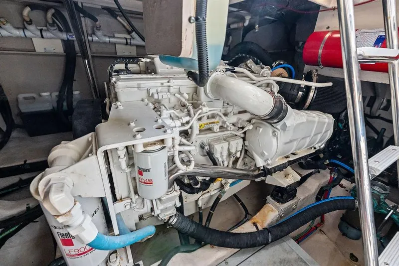 Slide: The Image of Engine room of a 2017 Sea Ray Fly 510 yacht, showcasing mechanical components. - 50
