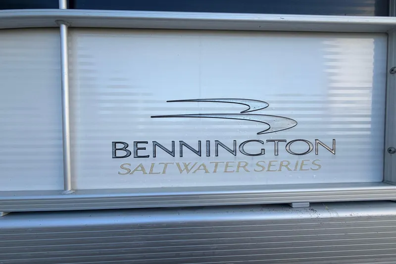 Slide: The Image of 2016 Bennington 22 SX Saltwater Series logo on boat exterior. - 14