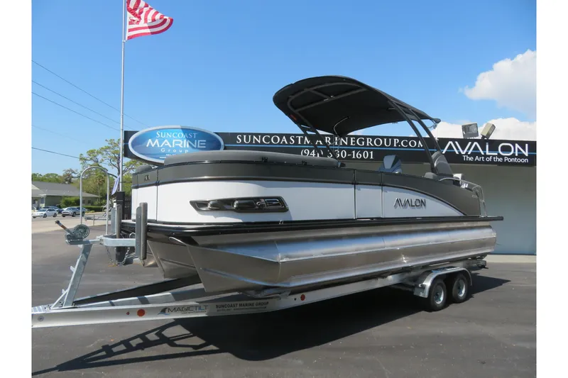 The Image of 2026 Avalon Catalina Quad Lounge Shift pontoon boat on trailer at Suncoast Marine Group. - 0