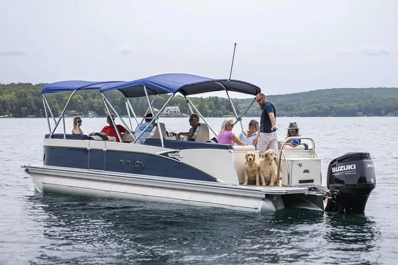 Slide: The Image of 2026 Avalon Catalina Quad Lounge Shift pontoon boat on trailer at Suncoast Marine Group. - 10