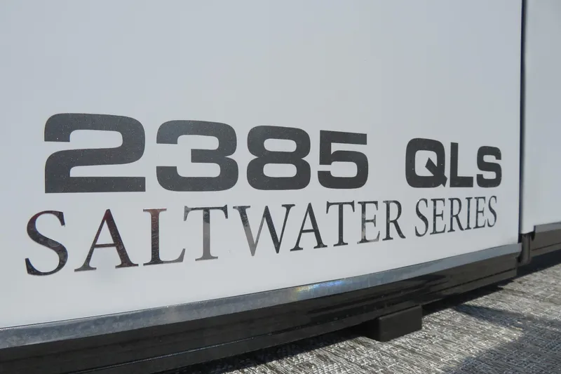 Slide: The Image of 2026 Avalon Catalina Quad Lounge Shift 23' Saltwater Series 2385 QLS branding. - 21