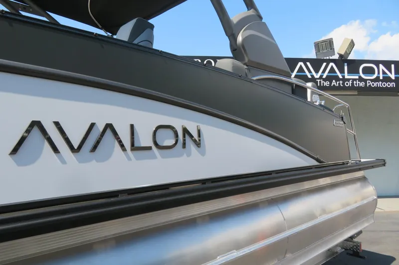 Slide: The Image of 2026 Avalon Catalina Quad Lounge Shift pontoon boat, showcasing sleek design and branding. - 22