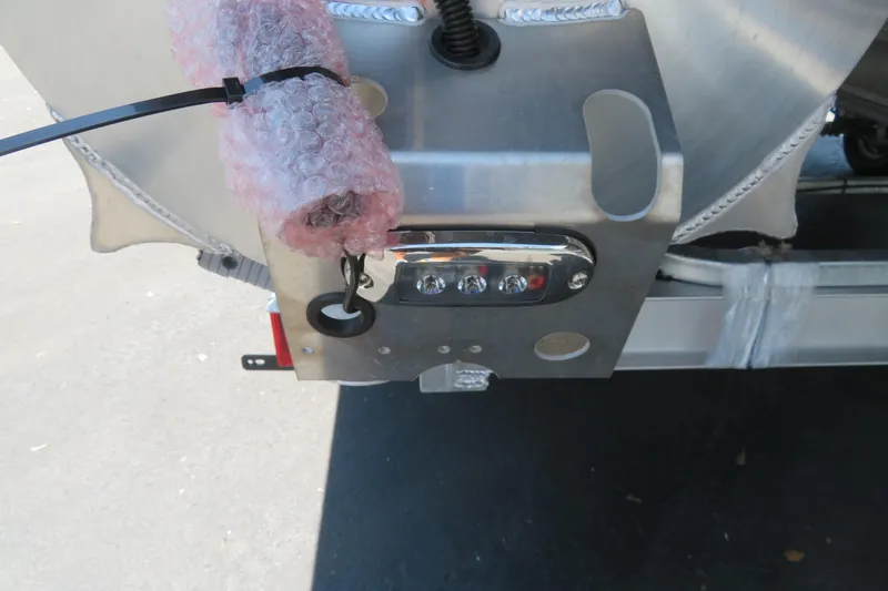 Slide: The Image of Close-up of 2026 Avalon Catalina Quad Lounge Shift boat detail with protective wrap. - 23