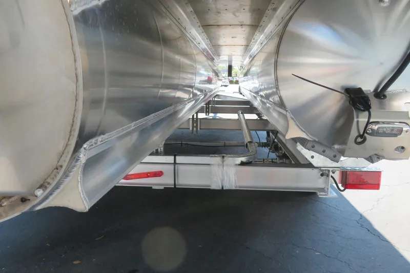 Slide: The Image of Underneath view of 2026 Avalon Catalina Quad Lounge Shift pontoon boat, showcasing aluminum pontoons. - 25