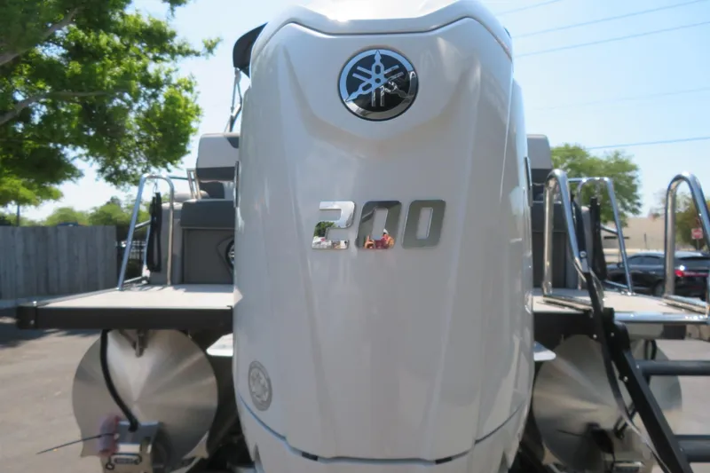 Slide: The Image of 2026 Avalon Catalina Quad Lounge Shift boat with Yamaha 200 engine. - 28