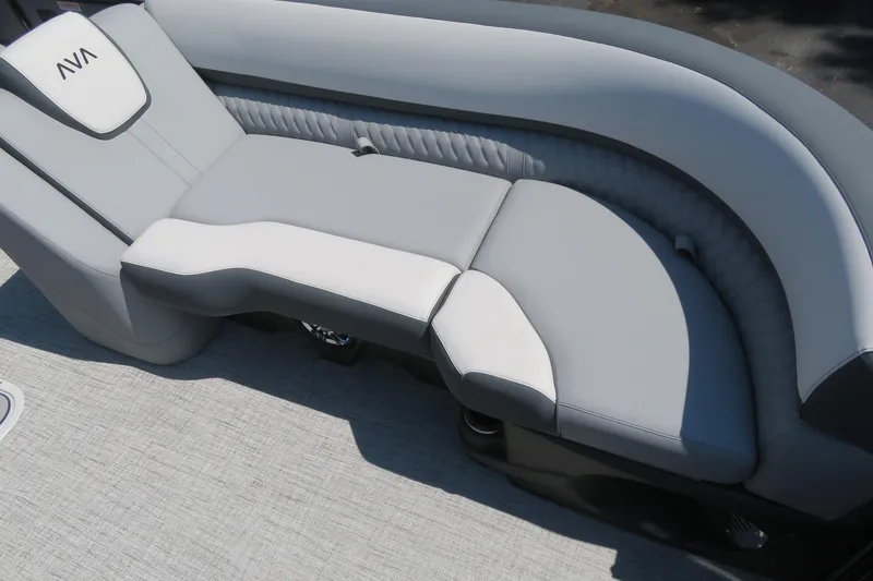 Slide: The Image of 2026 Avalon Catalina Quad Lounge Shift boat seating, featuring sleek gray and white upholstery. - 33