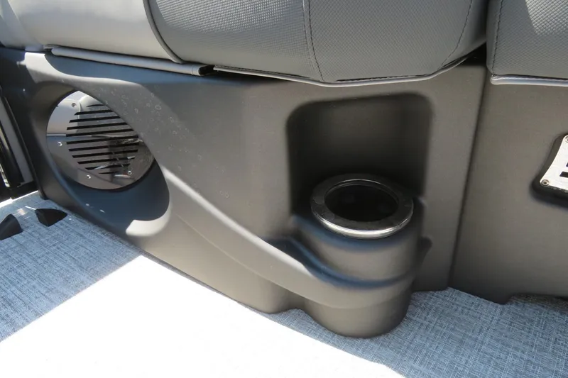 Slide: The Image of Cup holder and speaker detail in 2026 Avalon Catalina Quad Lounge Shift boat. - 37
