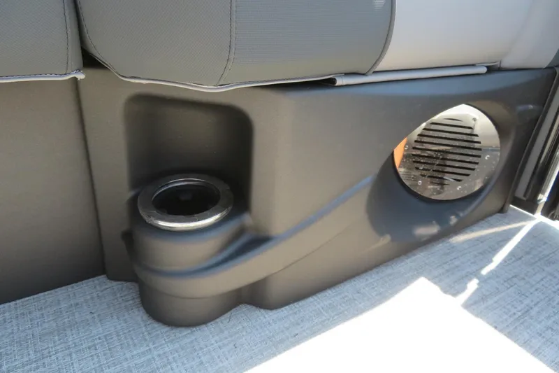 Slide: The Image of 2026 Avalon Catalina Quad Lounge interior with cup holder and speaker detail. - 39