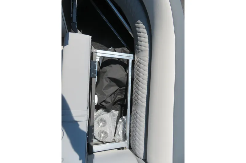 Slide: The Image of 2026 Avalon Catalina Quad Lounge Shift interior storage compartment with quilted upholstery detail. - 41