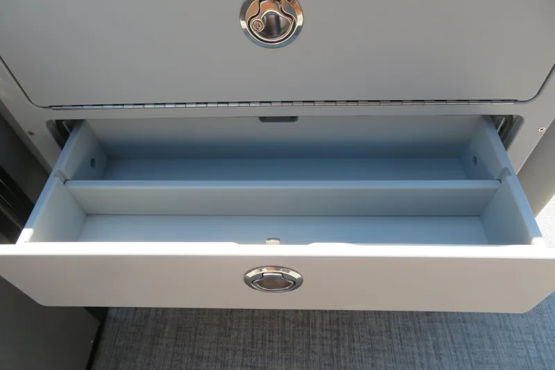 Slide: The Image of Open storage drawer in 2026 Avalon Catalina Quad Lounge Shift boat. - 44