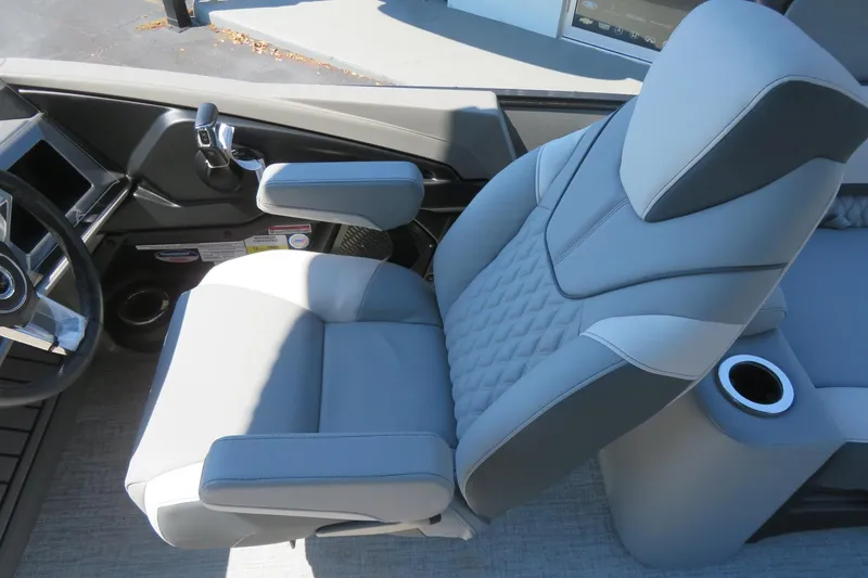 Slide: The Image of Luxurious captain's chair in 2026 Avalon Catalina Quad Lounge Shift boat cockpit. - 52