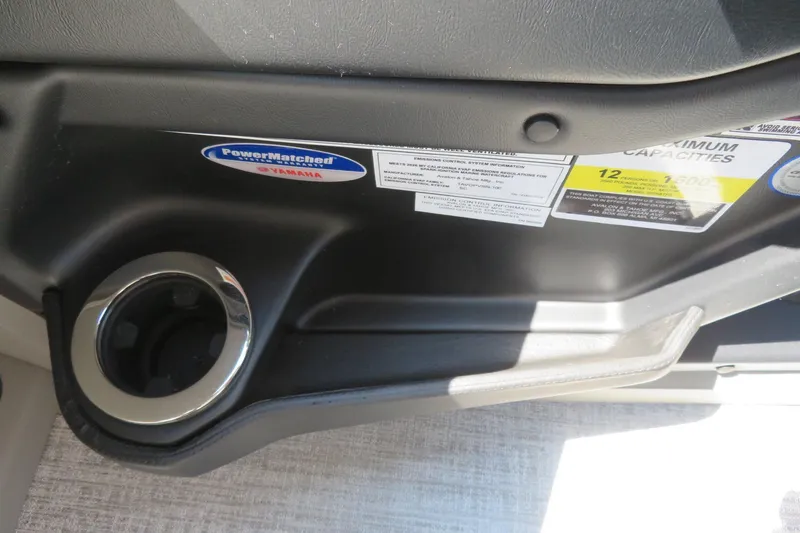 Slide: The Image of 2026 Avalon Catalina Quad Lounge Shift interior detail with cup holder and capacity labels. - 63