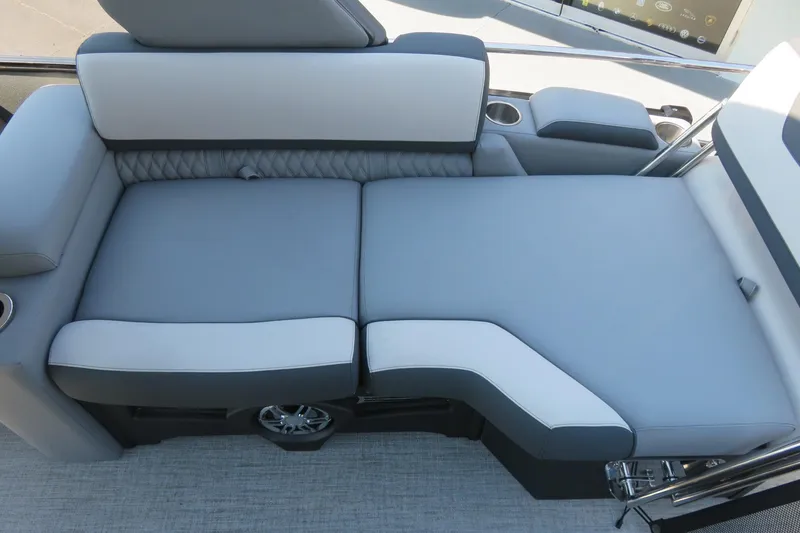 Slide: The Image of Luxurious seating on 2026 Avalon Catalina Quad Lounge Shift boat, featuring sleek gray upholstery. - 66