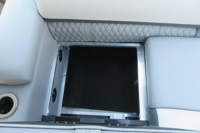 Slide: The Image of 2026 Avalon Catalina Quad Lounge Shift boat seat storage compartment with quilted upholstery. - 71