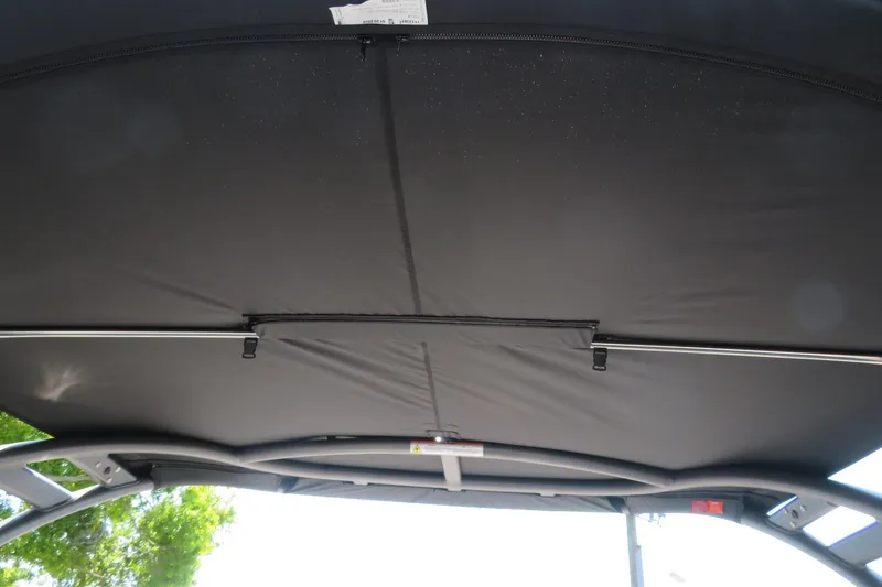 Slide: The Image of 2026 Avalon Catalina Quad Lounge Shift boat canopy, showcasing sturdy frame and fabric. - 73