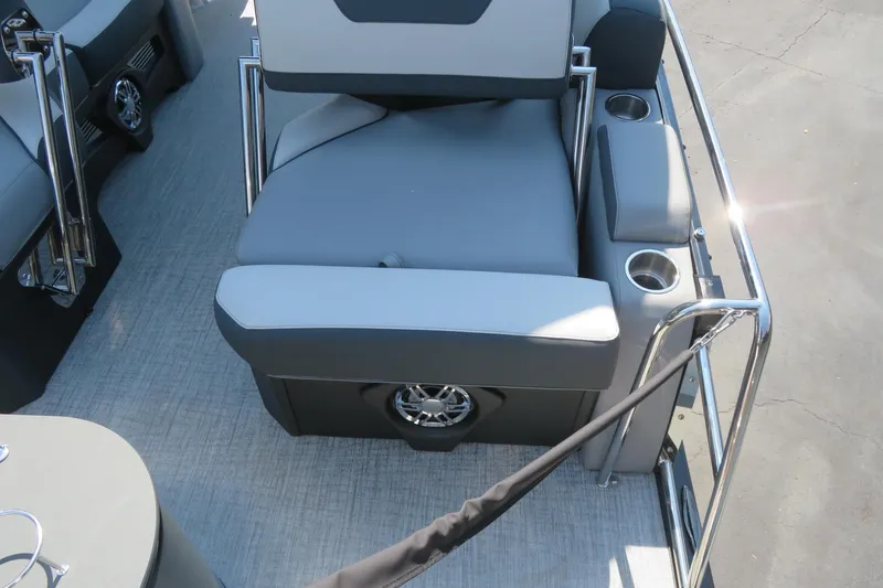 Slide: The Image of 2026 Avalon Catalina Quad Lounge Shift boat seating with cup holders and speaker. - 79