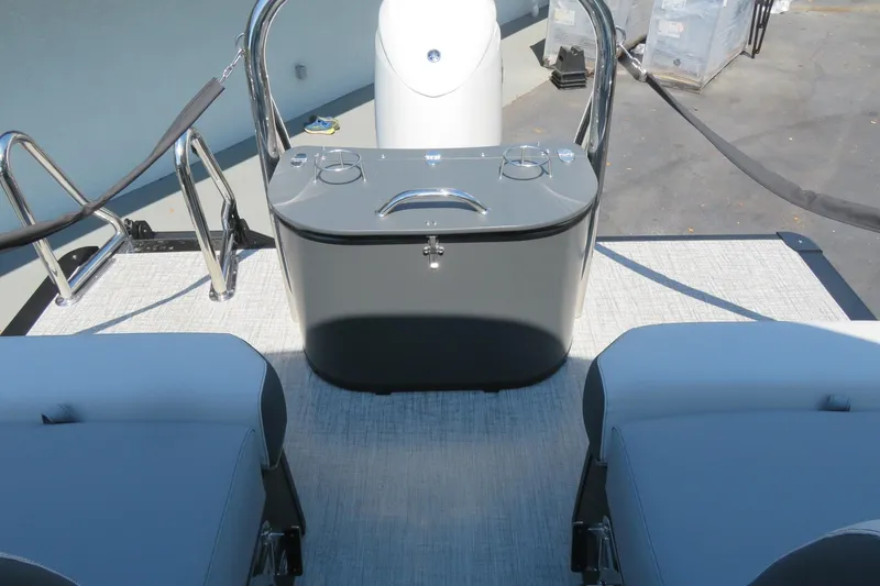 Slide: The Image of 2026 Avalon Catalina Quad Lounge Shift boat interior with seating and control panel. - 81