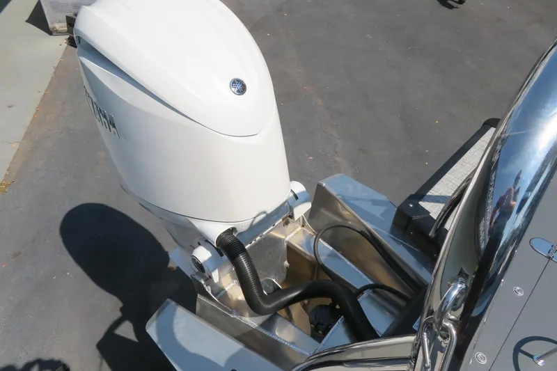 Slide: The Image of 2026 Avalon Catalina Quad Lounge Shift boat with Yamaha outboard motor. - 84