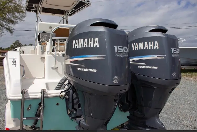 Slide: The Image of 2001 Cobia 274 Center Console with twin Yamaha 150 four-stroke engines. - 6