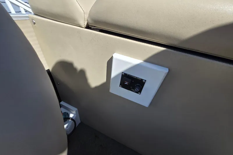 Slide: The Image of Interior view of a 2013 Bennington 2574 GL boat with control panel. - 30