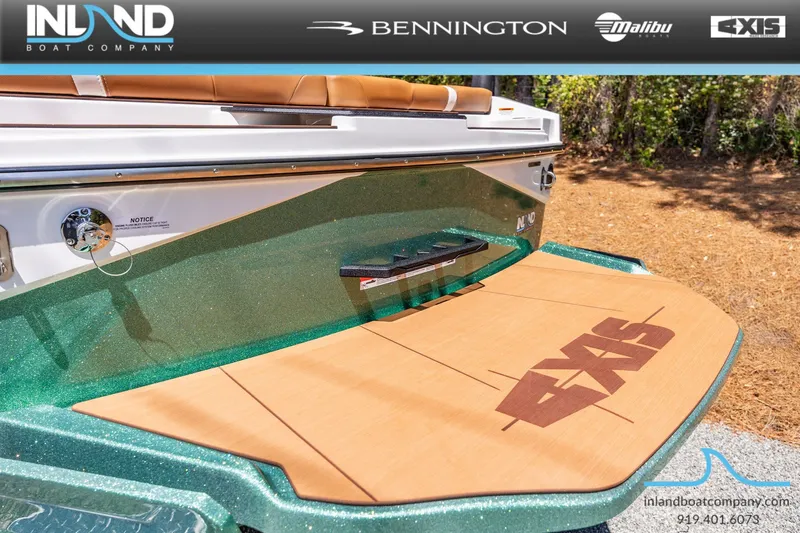 Slide: The Image of Axis T220 boat 2026 with green glitter finish and wood platform. - 10