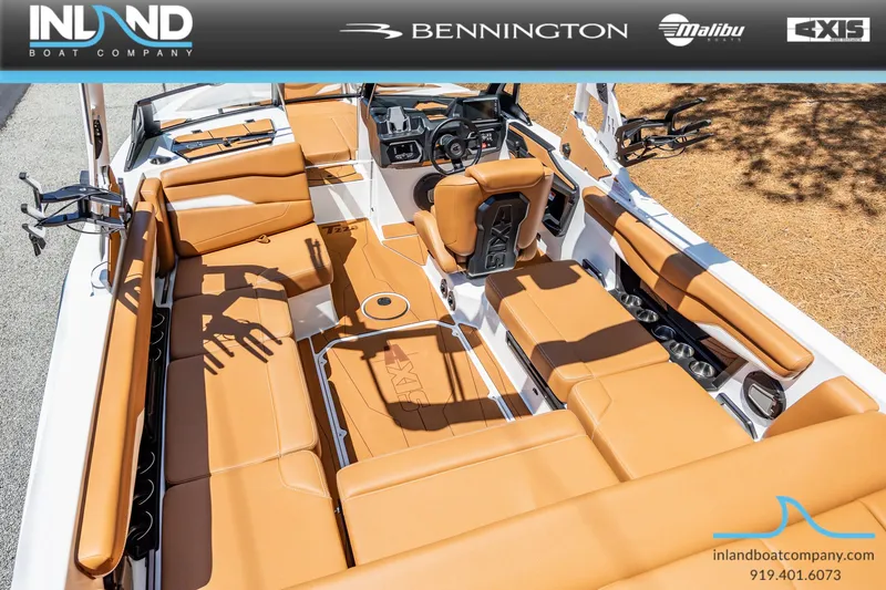Slide: The Image of Interior view of 2026 Axis T220 boat with brown leather seating. - 13