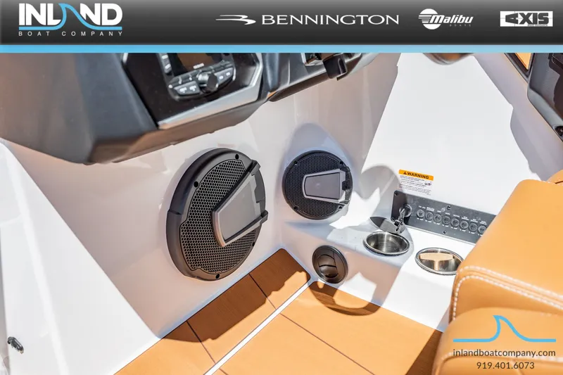 Slide: The Image of Interior of Axis T220 boat, featuring speakers and control console. - 20
