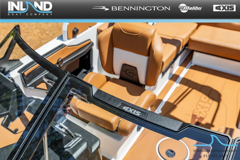 Slide: The Image of Interior of a 2026 Axis T220 boat with brown leather seats. - 21