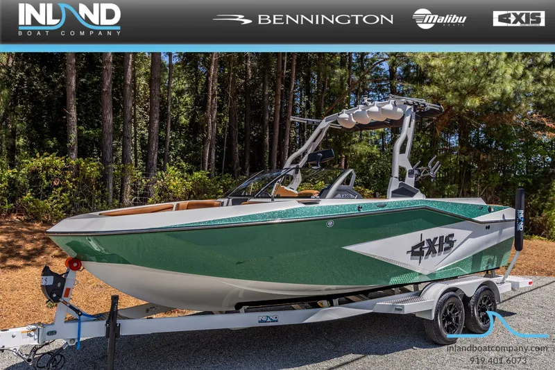 Slide: The Image of Green Axis T220 boat from 2026 on trailer in forest. - 22