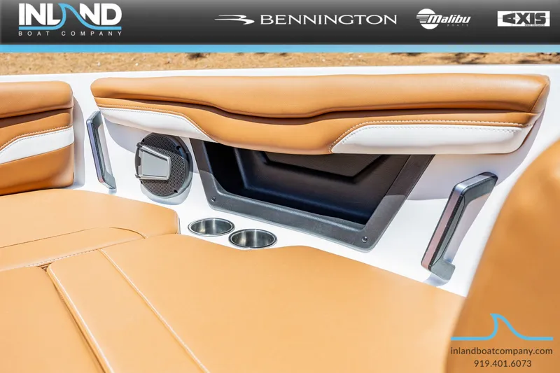 Slide: The Image of Interior of Axis T220 boat, 2026 model, featuring brown leather seats. - 25