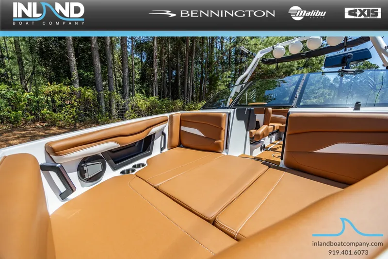 Slide: The Image of Interior view of Axis T220 boat, 2026 model, featuring brown leather seats. - 26
