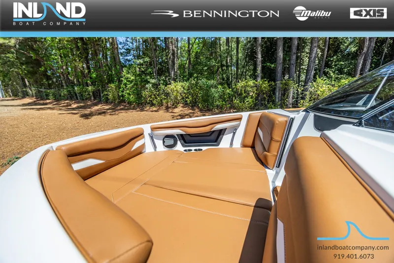 Slide: The Image of Luxurious interior of Axis T220 boat, 2026 model, featuring brown leather seats. - 27