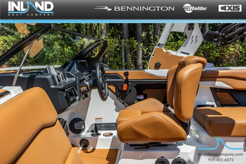 Slide: The Image of Interior of Axis T220 boat, 2026 model, featuring brown leather seats. - 30