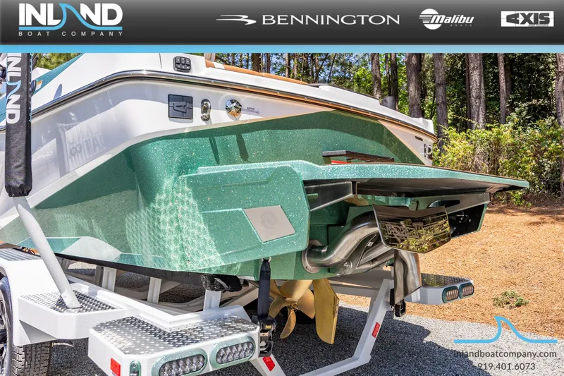 Slide: The Image of Rear view of Axis T220 boat, 2026 model, on a trailer. - 8
