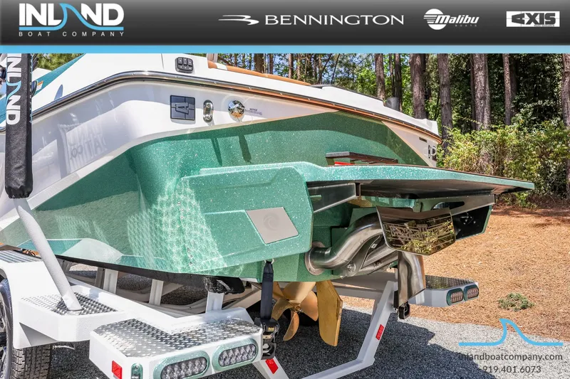 Slide: The Image of Rear view of a 2026 Axis T220 boat on a trailer. - 9