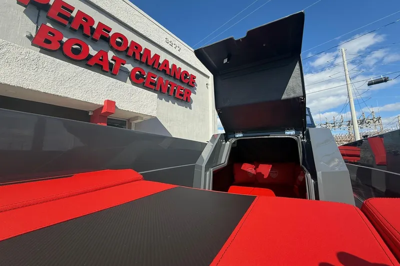 Slide: The Image of 2026 Iron 907 boat at Performance Boat Center, featuring red and black seating. - 18