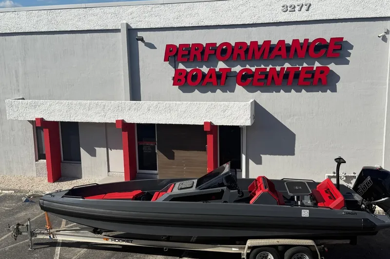 Slide: The Image of 2026 Iron 907 boat at Performance Boat Center, parked on a trailer. - 26