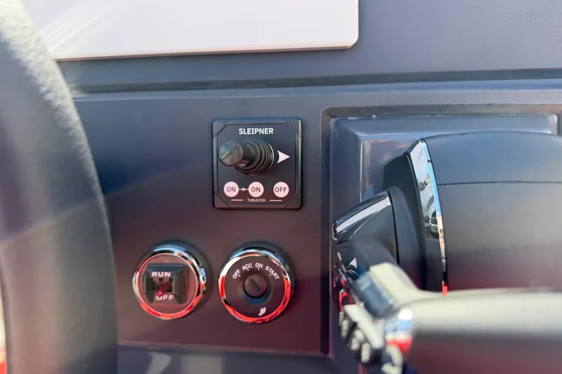 Slide: The Image of Control panel of Iron 907, 2026 model, featuring Sleipner thruster and ignition switches. - 30