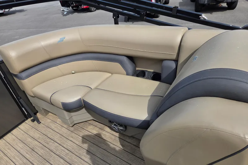 Slide: The Image of 2024 Starcraft EXS 1 boat interior with beige and gray seating. - 10